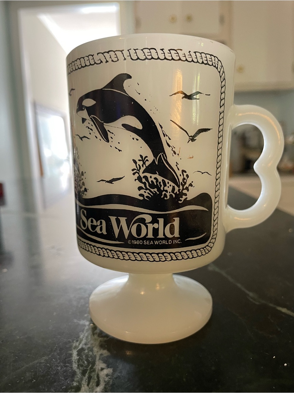 Vintage 1980 Sea World Milk Glass Pedestal Mug Orca Dolphin Coffee Cup